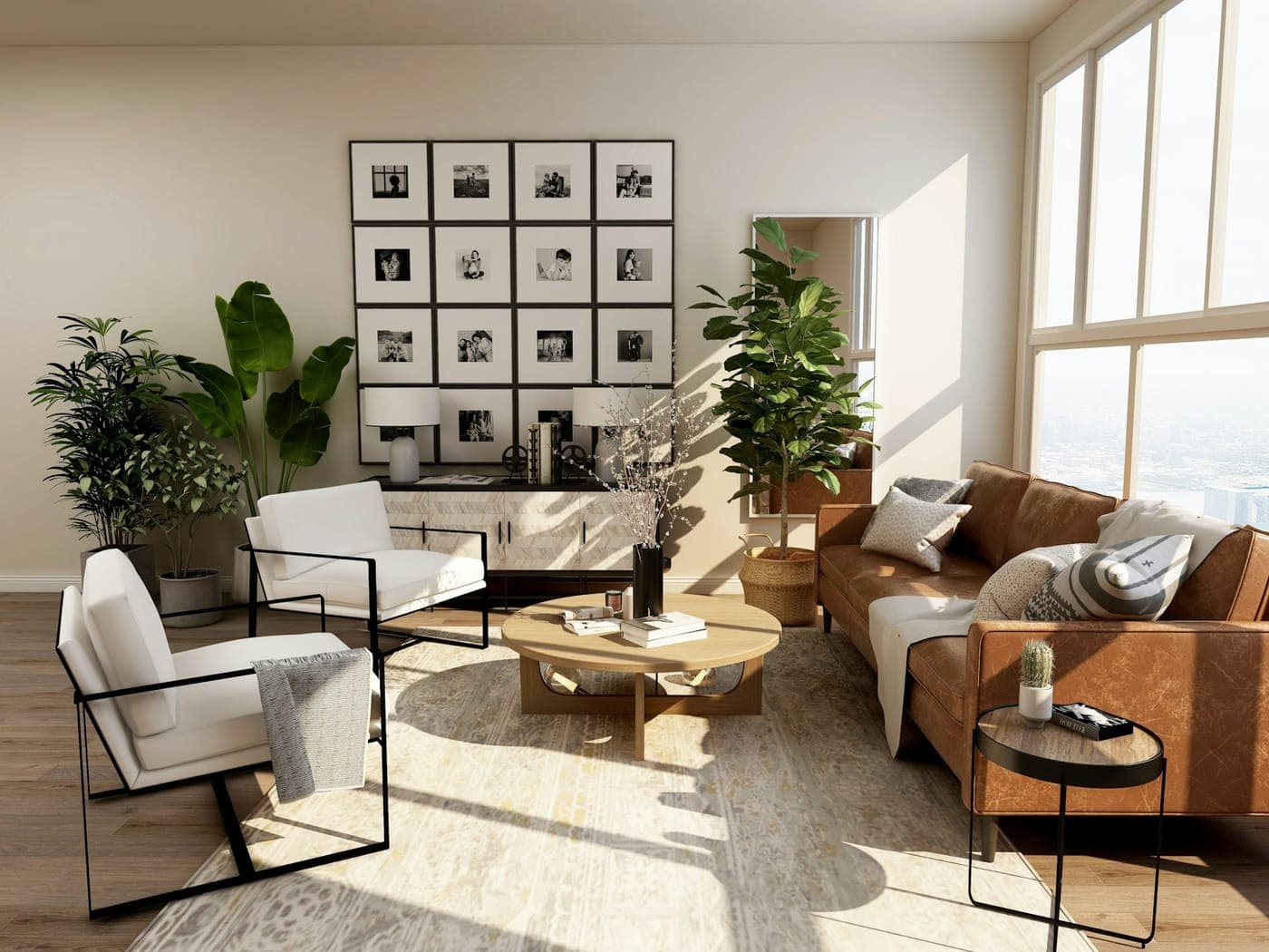 Bright double-height lounge with a framed gallery wall and leather sofas
